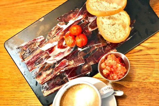 Iberian ham experience with traditional breakfast in center Madrid