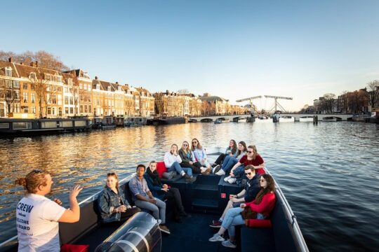 Discover Amsterdam's Canals: Relaxing Open Boat Cruise Adventure!